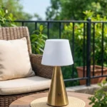 Neje Lighting | Aria : Sculptural Minimalism for Modern Luxury Interiors Close-up of Aria gold touch sensor lamp showing the high-fidelity pleated fabric shade and flicker-free warm white LED glow.