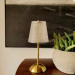 Neje Lighting | Palazio : Signature Crystalline Ambiance & Cordless Portability Minimalist Palazio gold touch lamp with a crystalline diffuser emitting a warm 3000K ambient glow, ideal for luxury dining and bedside decor.