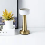 Helios Touch Lighting Lamp: Modern gold cordless table lamp with smart touch dimming and wellness-focused LED warm glow for luxury Indian bedrooms.