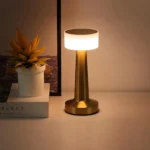 Helios Touch Lighting Lamp: Modern gold cordless table lamp with smart touch dimming and wellness-focused LED warm glow for luxury Indian bedrooms.