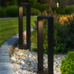 Minimalist-LED-Bollard-Path-Light-Outdoor-2026 Premium Modern Bollard Light: Architectural outdoor LED pathway lamp with IP65 waterproof rating for luxury Indian garden and driveway design.