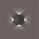 Round-Four-Way-Wall-Light-Symmetric-Architecture-2026 Round Four Way Wall Light: Modern black 4-way LED exterior fixture with IP65 waterproof rating for luxury elevation lighting in India.