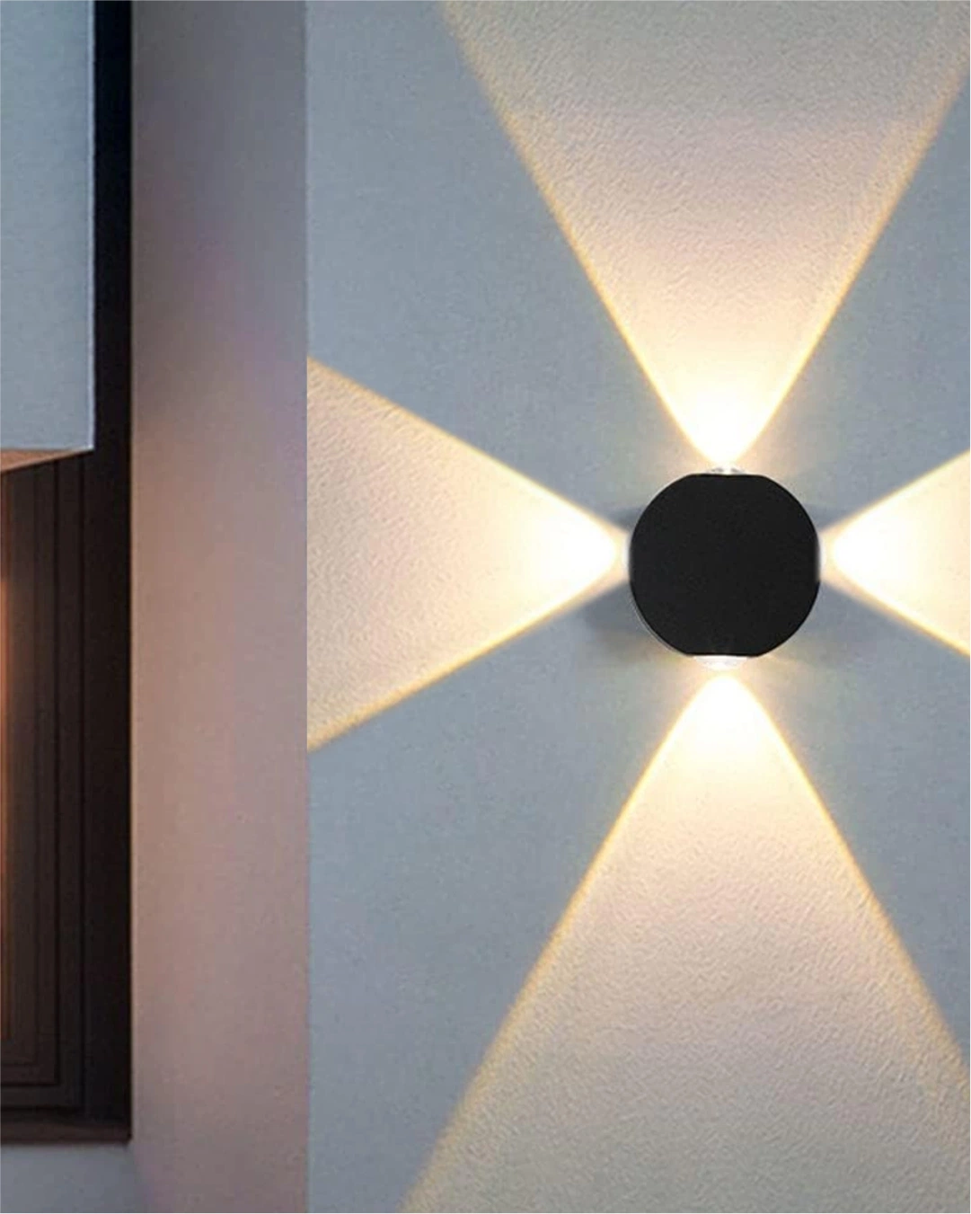 Round Four Way Wall Light: Modern black 4-way LED exterior fixture with IP65 waterproof rating for luxury elevation lighting in India.