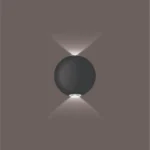 Round-Two-Way-Wall-Light-Symmetric-Elevation-2026 Round Two Way Wall Light: Modern black cylindrical exterior LED lamp with IP65 waterproofing for high-end Indian home facades.